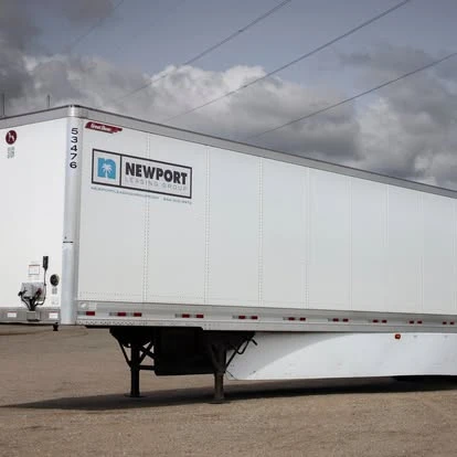 Full side of a Newport dry van trailer in the yard